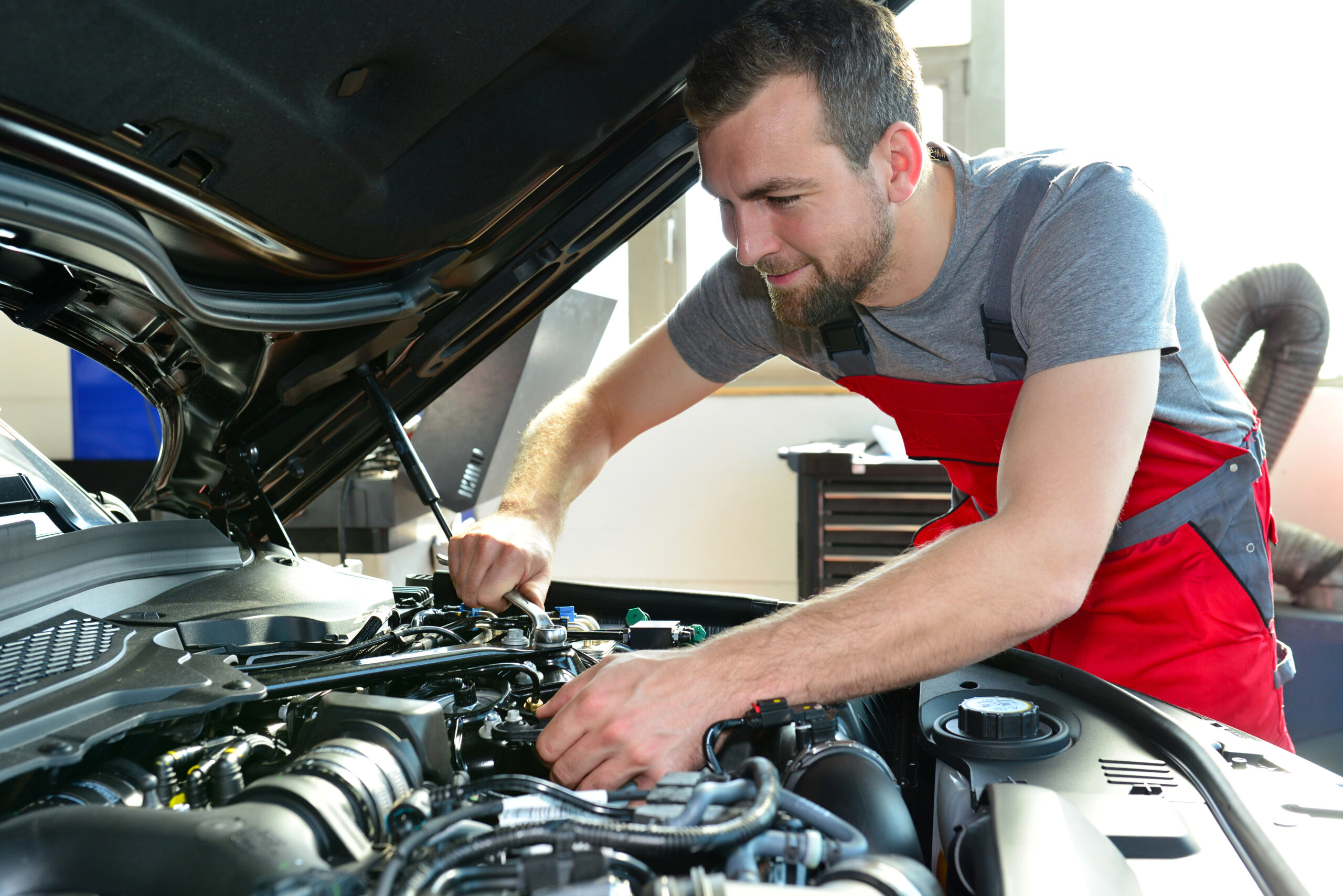 Professional Mechanic Repairs Engine Of Car